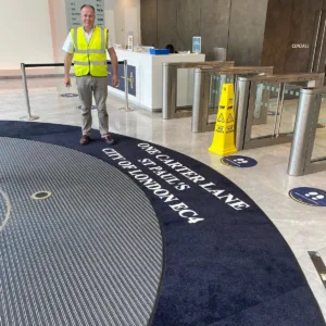 Large custom shape logo mat installed in London