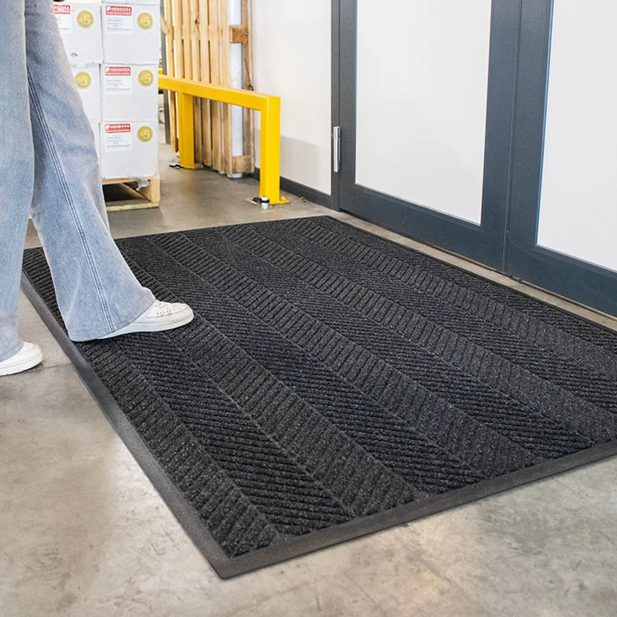 black-waterhog-dirt-trapper-mat-in-warehouse